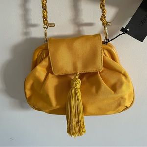 Desmo bright yellow crossbody bag with woven chain strap and tassel